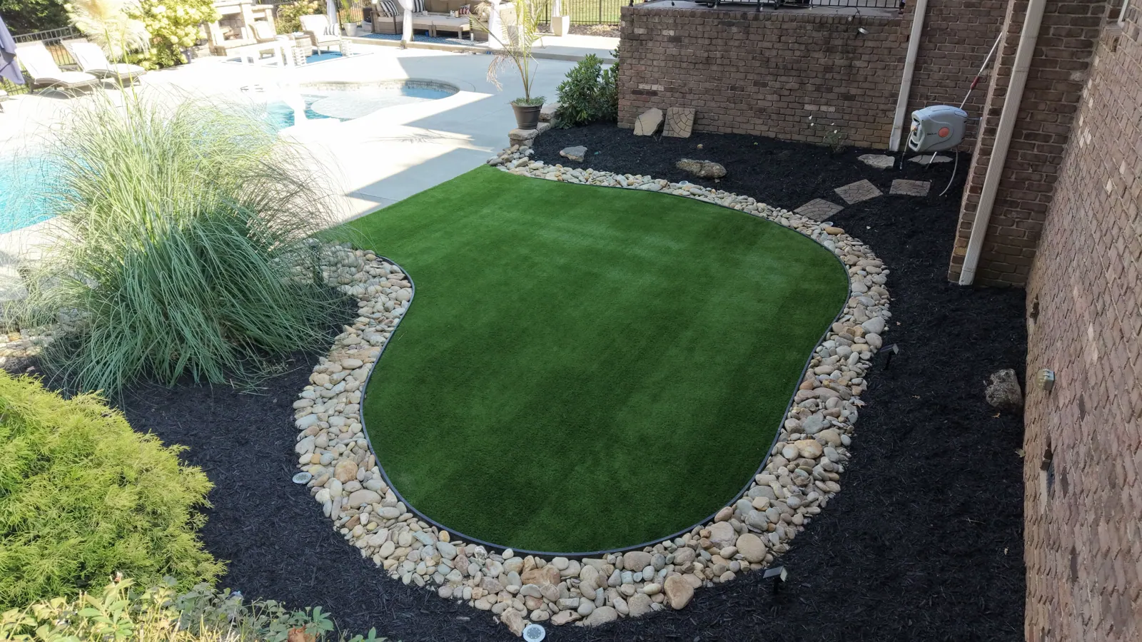 Poolside synthetic turf install in Oak Ridge NC