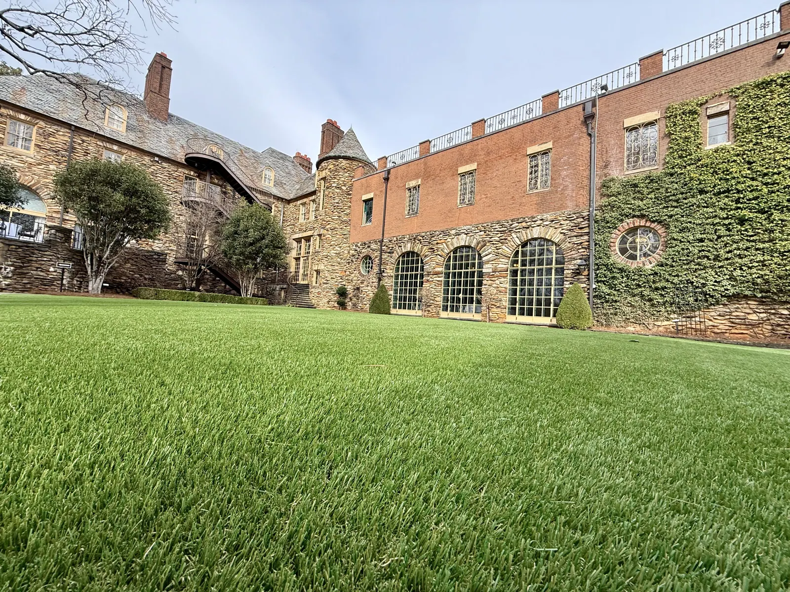 Synthetic lawn turf installation